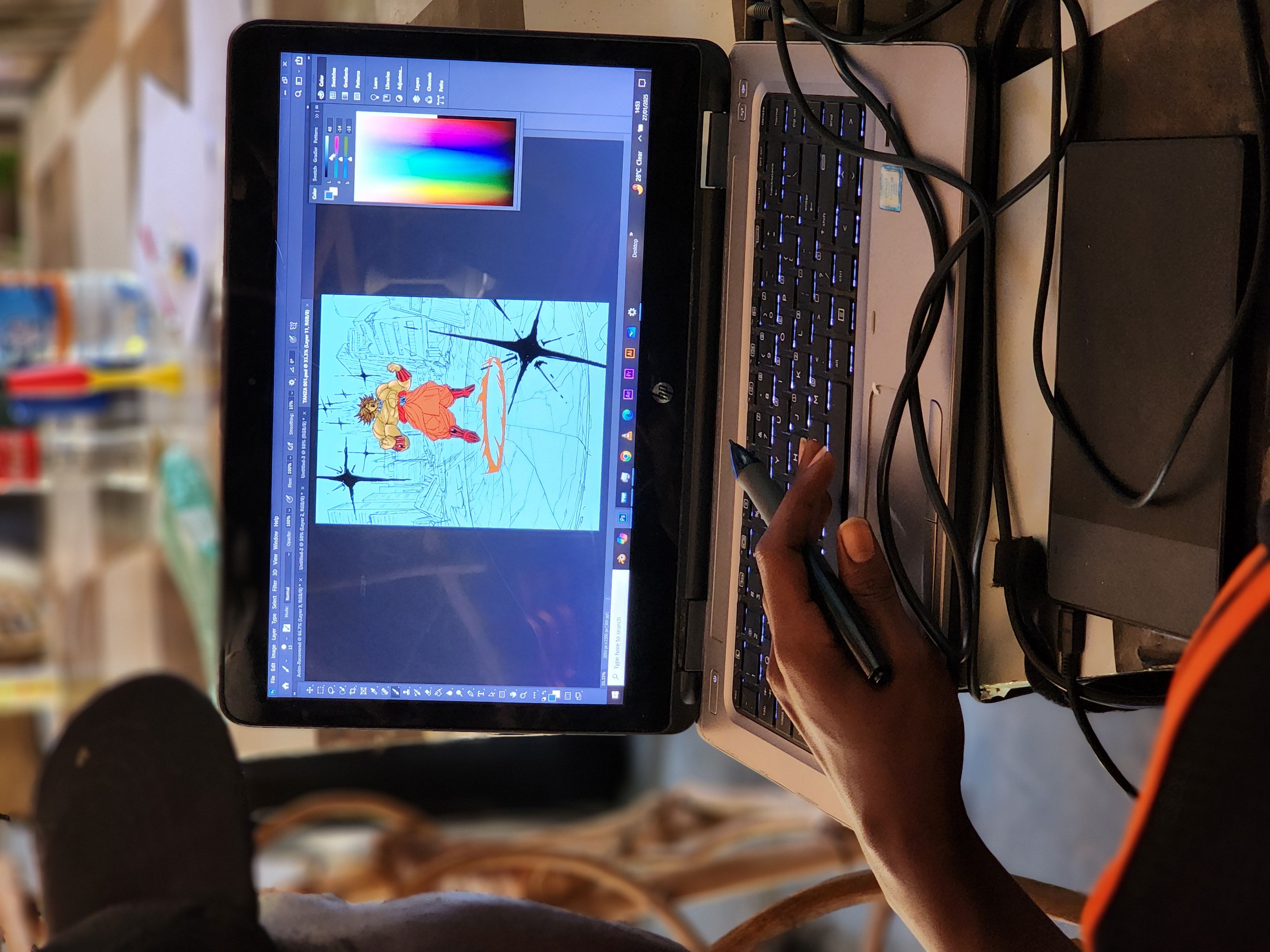 TanzAnimation participants collaborating around a laptop